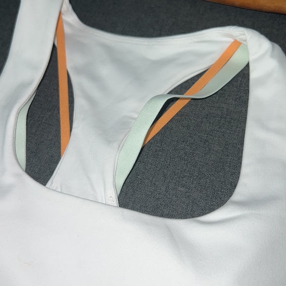 White fabletics sports bra with multicolor straps - Picture 4 of 11